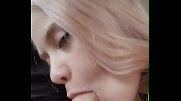 Cute blonde passionately deepthroats a big cock in the car