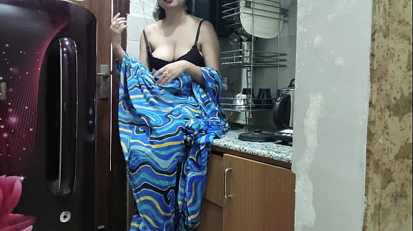 Indian stepmom watches and enters her stepson’s Kitchen to fuck him