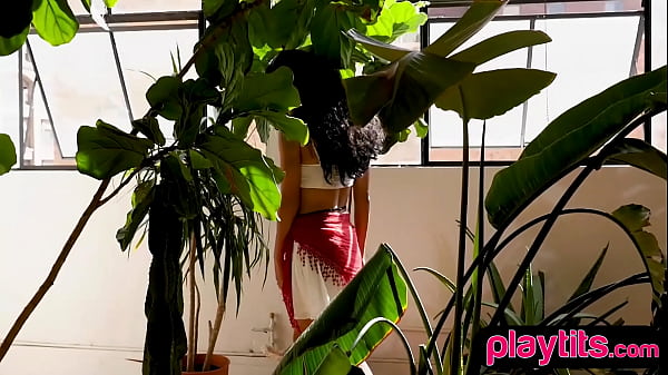 Busty petite Latina beauty strips to flaunt her big pierced boobs