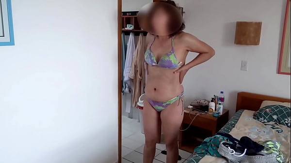 On the beach, very aroused, I masturbate with my stepson and he cums in my pussy