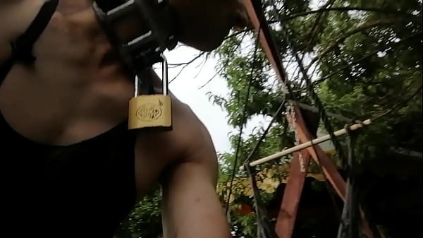 Bdsmslaveboy in his garden