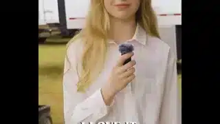 Nellie Fisher dances in a bikini