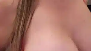 TEASE – Nurse playing with fake tits