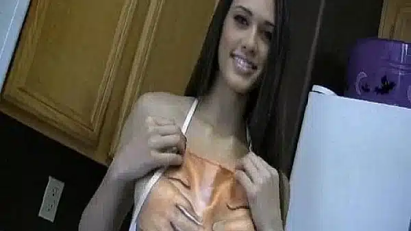 Tiff Love putting honey on her perky tits