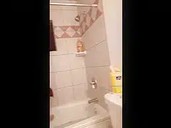Wife cleans tub in the nude