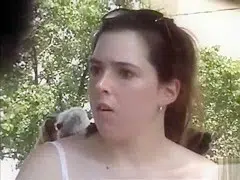 Chubby brunette coed sits with her legs wide open