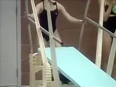 Girls swim in their tight costumes