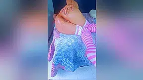 Thick Latina Bombshell In Pink Stockings Side View