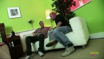 This busty brunette milf looks amazing while taking a dick in the ass and sucking another big dick