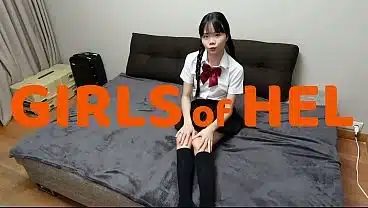 Cute asian girl in school uniform with pigtails fingers herself and plays with her pussy