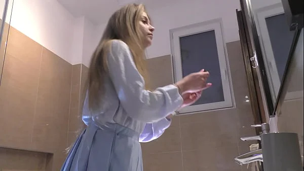 Skinny blonde college girl in the bathroom takes off her lace panties to show her ass and pussy lips