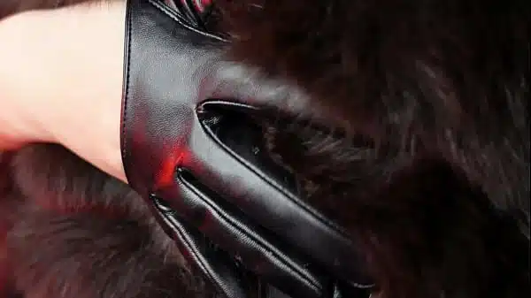 ASMR video of beauty in black gloves sexual sounding and close up