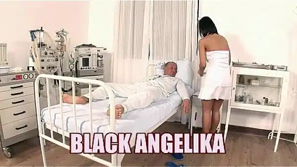 Slutty nurse Black Angelika fucks in the hospital bed